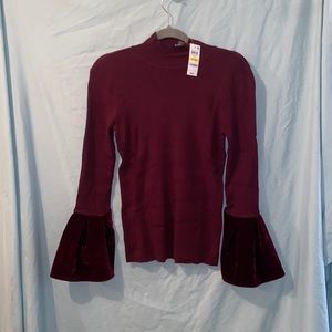 Maroon sweater flared sleeves